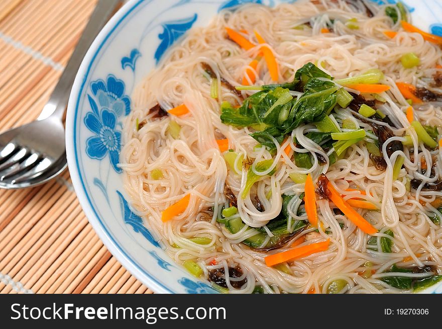 Asian style vermicelli delicacy prepared with healthy vegetables. Asian style vermicelli delicacy prepared with healthy vegetables.