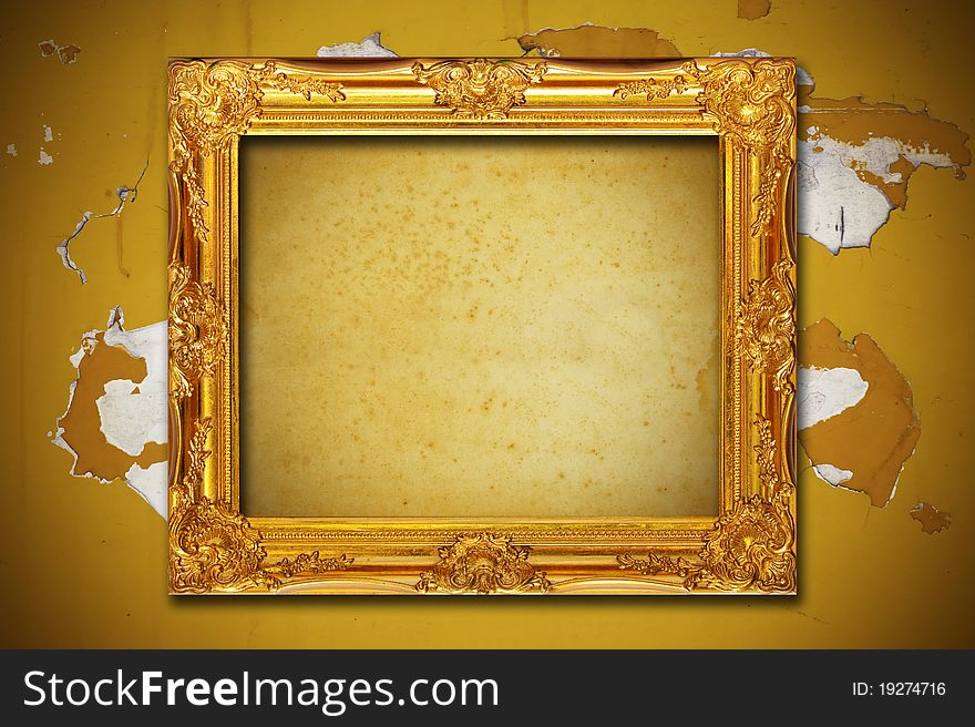 Photo frame on aged brown wall background