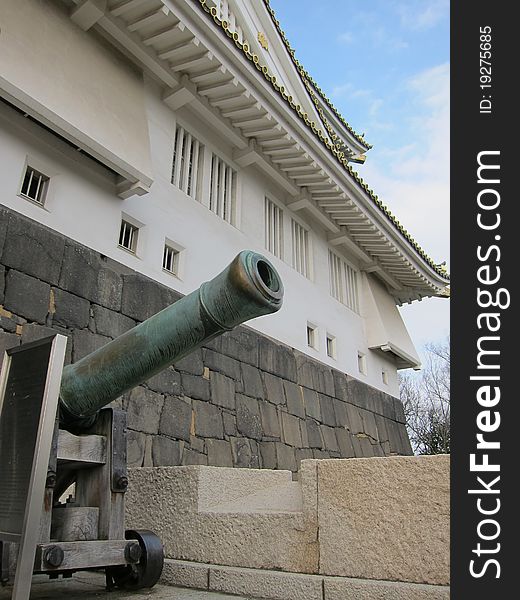 A great view of the ancient Osaka Castle with cannon, which located in the heart of Osaka City, Japan. A great view of the ancient Osaka Castle with cannon, which located in the heart of Osaka City, Japan.