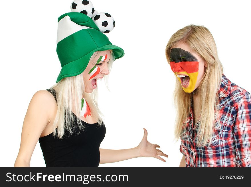 Two sports fans with painted faces