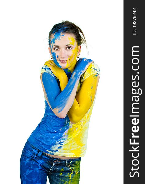 Young woman covered with paint looking at camera. Young woman covered with paint looking at camera