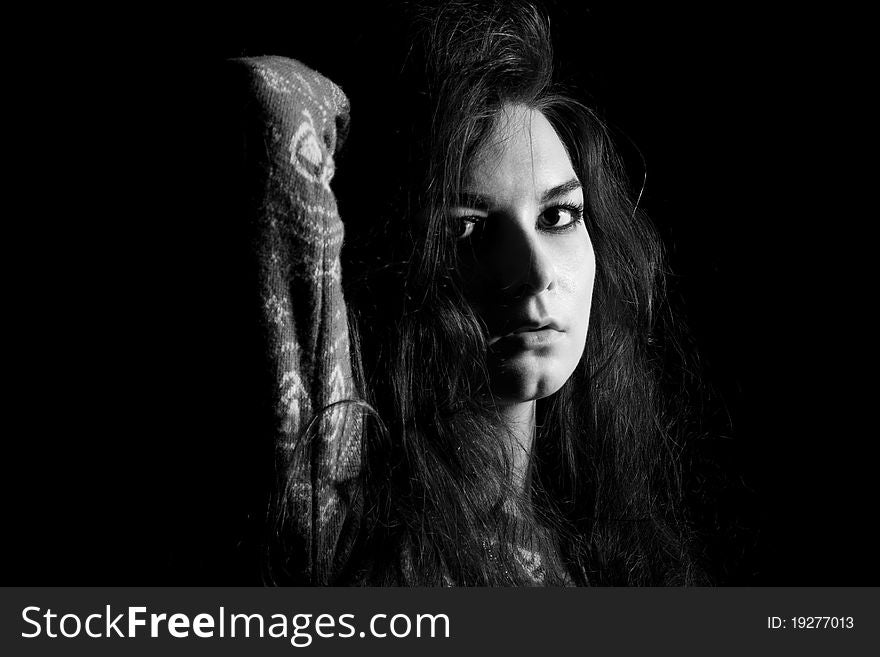 The beautiful mystical portret of women on the black background.