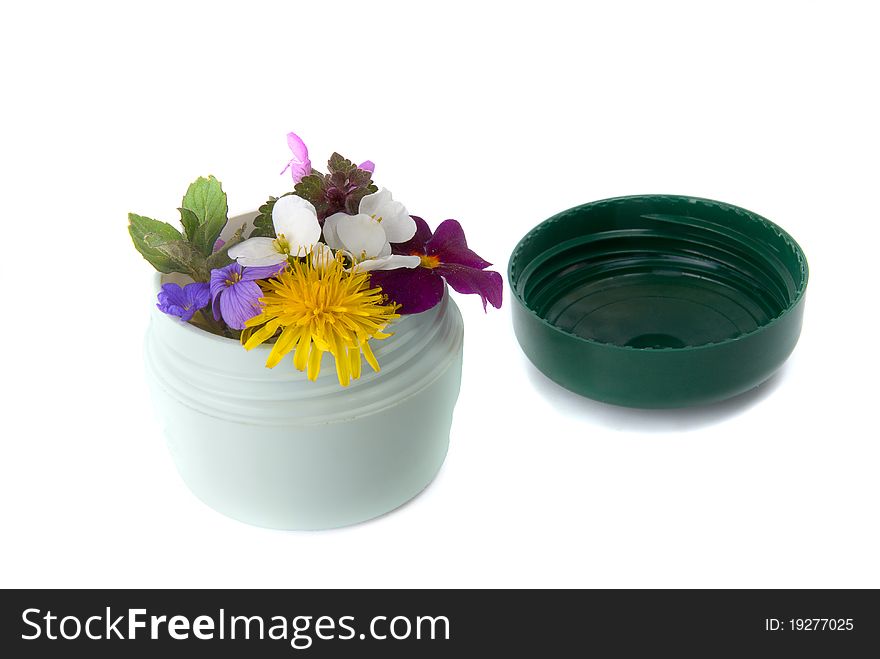 Jar with flowers as cream. Jar with flowers as cream