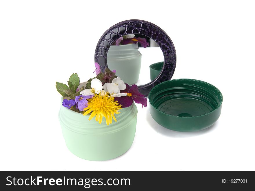 Jar with flowers as cream. Jar with flowers as cream