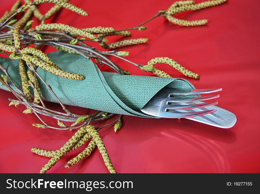 Holiday table setting with fork, knife, napkin, plate. Holiday table setting with fork, knife, napkin, plate