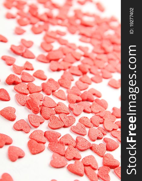 Background of a large number of red hearts. Tasty Baking decorations. Background of a large number of red hearts. Tasty Baking decorations