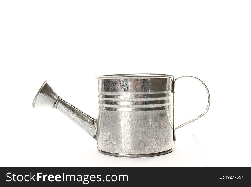 Watering Can- Tilted isolated on a white background. Watering Can- Tilted isolated on a white background