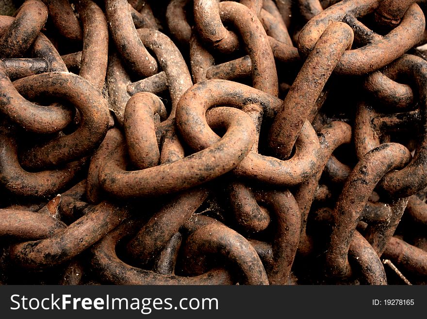 An old chain covered in rust -- corroded links of iron -- The destructive action of time upon matter. An old chain covered in rust -- corroded links of iron -- The destructive action of time upon matter