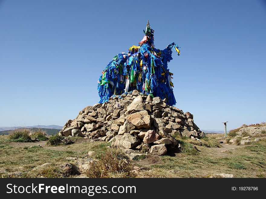 A shaman ovoo in the steppes of Mongolia, in Asia. A shaman ovoo in the steppes of Mongolia, in Asia