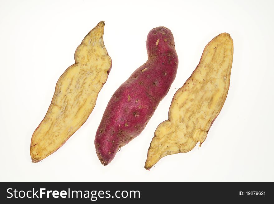 Sweet Potatoes With Sectional View. Image Is Isolated On White Background