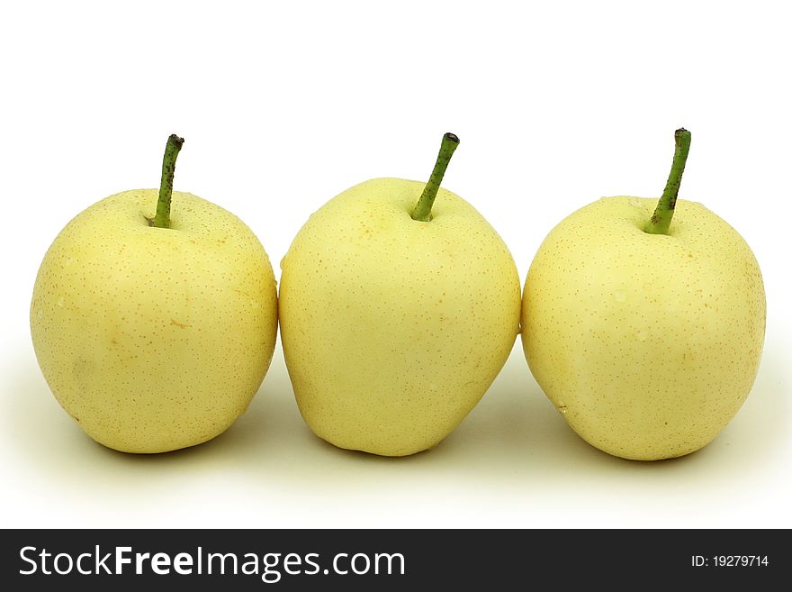 Three yellow pears isolated on white. Three yellow pears isolated on white.