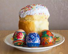 Easter Cake And Three Eggs Stock Photos