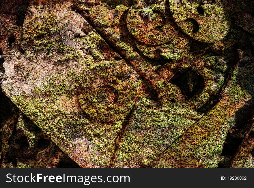 Composite image, simulating moss covering old metal tool items. Composite image, simulating moss covering old metal tool items.