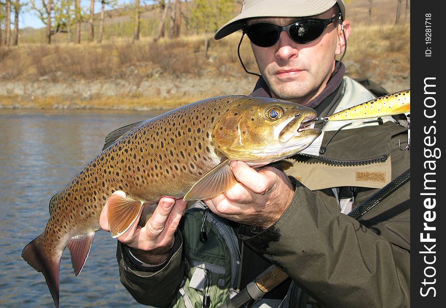 Fishing - fisherman catched big trout