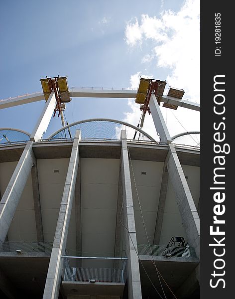 Big stadium pillars pointing towards the sky