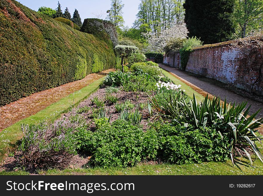 A Formal english Walled garden with flowerbeds and hedging. A Formal english Walled garden with flowerbeds and hedging