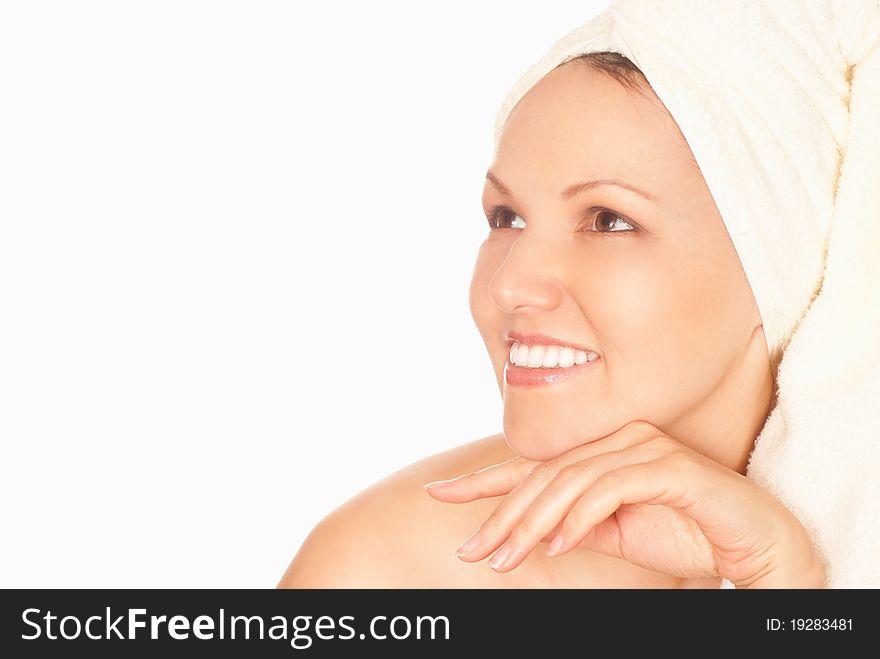 Beautiful young woman standing on a white background