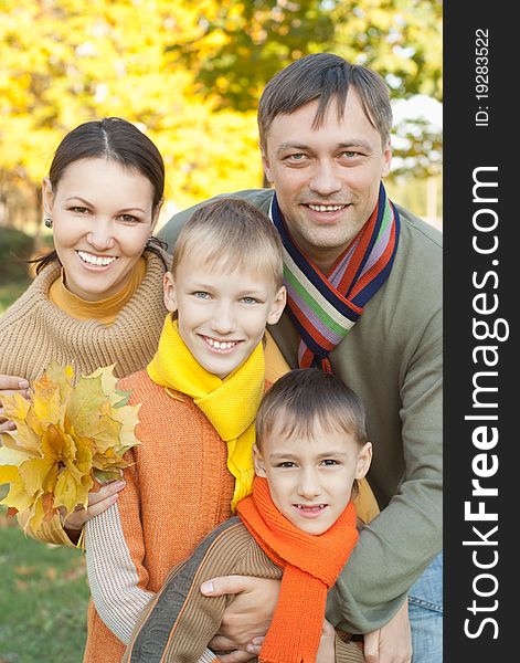 Portrait of a nice family on the nature