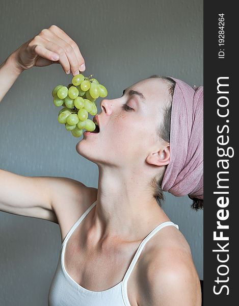 Woman Eating Grape