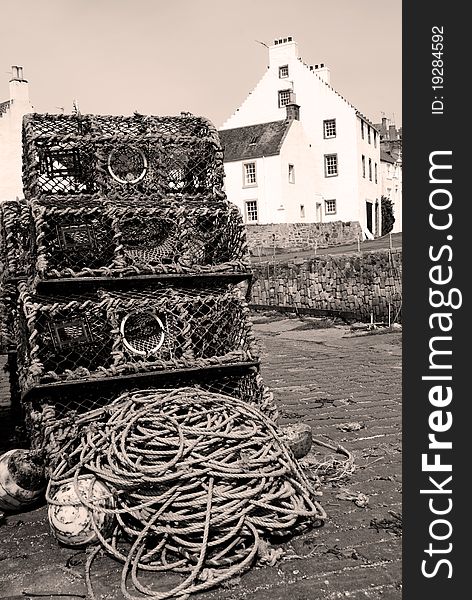 A vertical image of a tourist attraction in scotland,crail harbour. A vertical image of a tourist attraction in scotland,crail harbour.