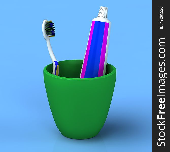 Toothbrush and gel toothpaste in a green cup