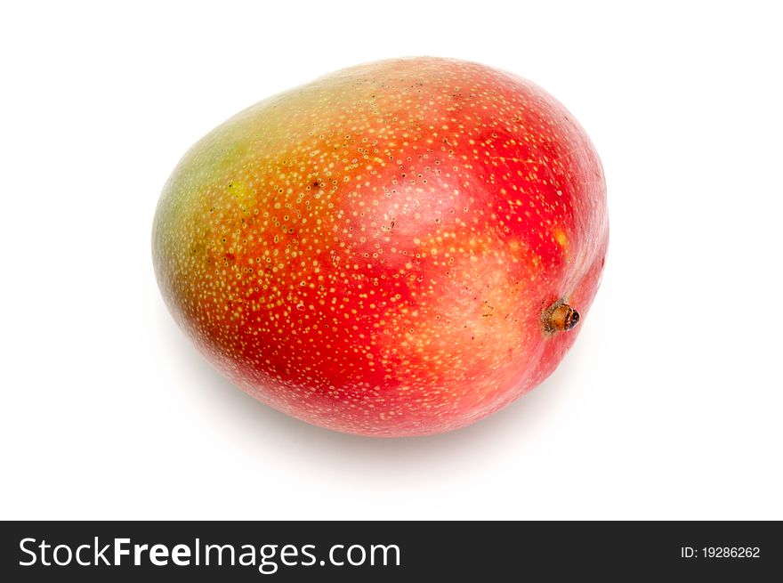 A fresh mango over a white background