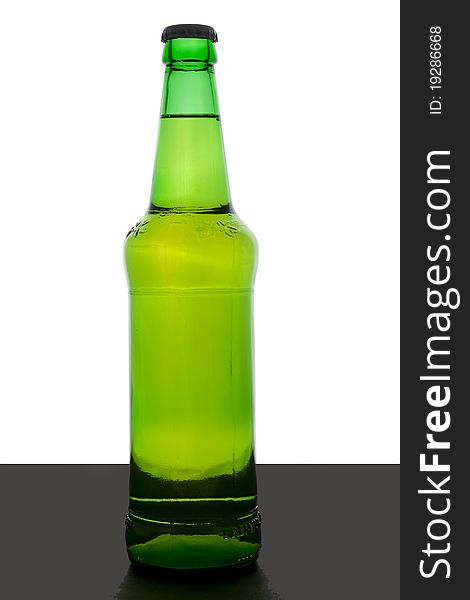 Green beer bottle with cap and no labels