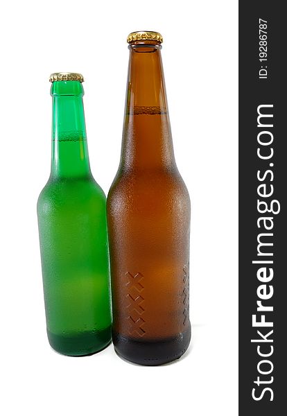 Green and brown beer bottles of different capacity. Green and brown beer bottles of different capacity