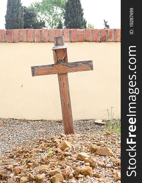 Cross on a grave in a cemetery. Cross on a grave in a cemetery