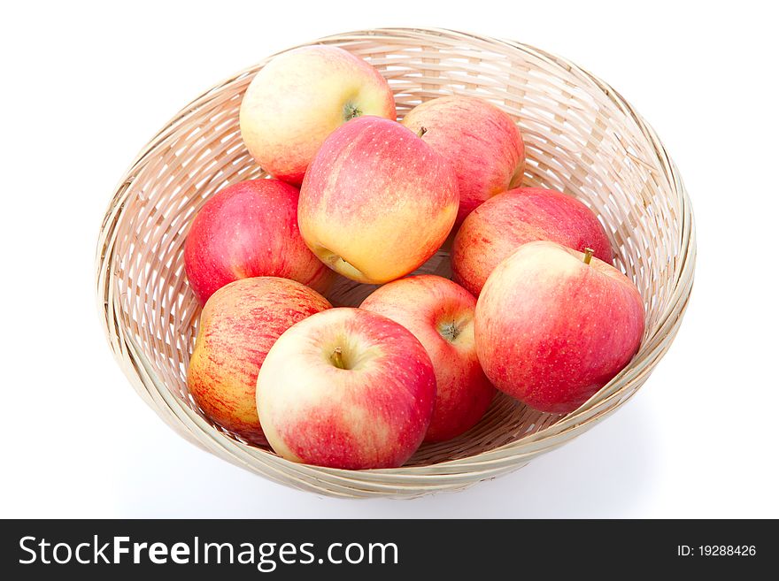 Basket of apples isolated on a white background