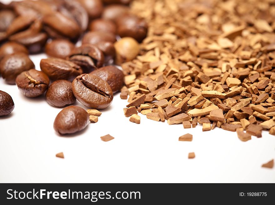 Closeup of a coffee beans and soluble coffee