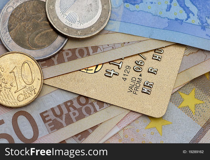 Closeup of Euro coins, banknotes and credit card. Closeup of Euro coins, banknotes and credit card