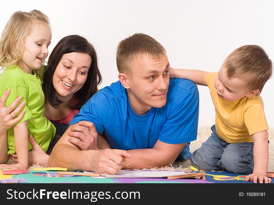 Nice family drawing on the carpet on white. Nice family drawing on the carpet on white