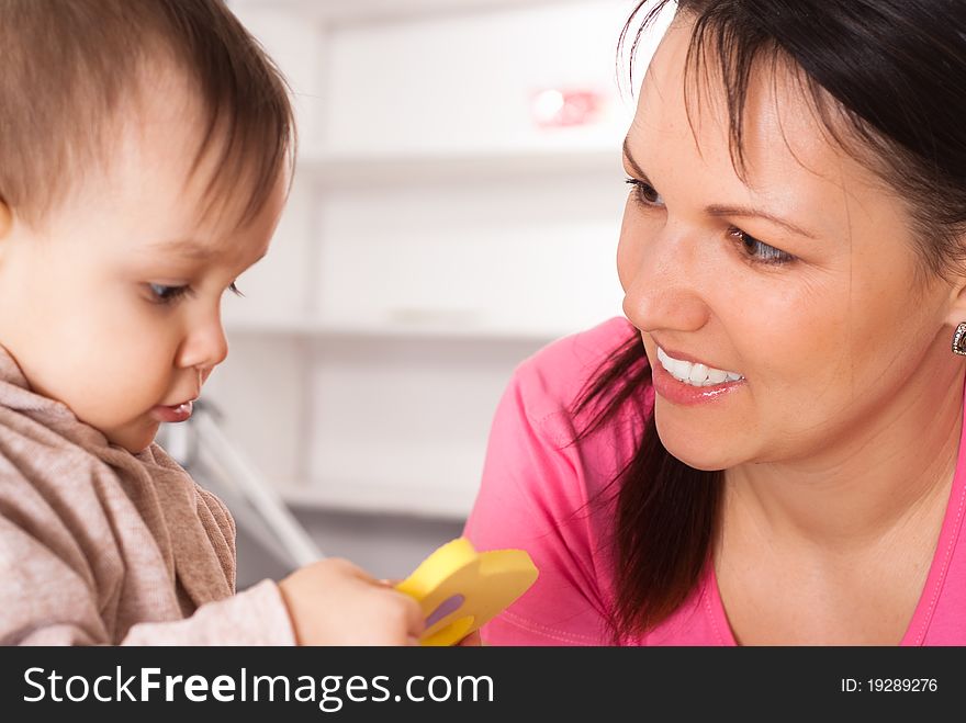 Mom and a baby on a white background