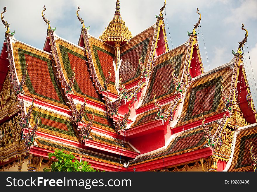 Colorful, decorative details on the roof of a temple in Thailand. Colorful, decorative details on the roof of a temple in Thailand