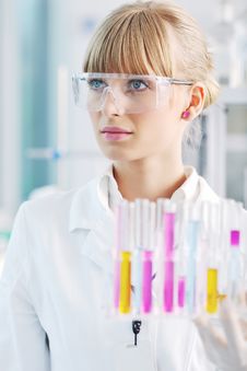 Female Researcher Holding Up A Test Tube In Lab Royalty Free Stock Image Female Researcher Holding Up A Test Tube In Lab Royalty Free Stock Image
