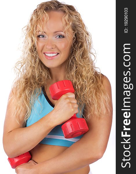 Woman is smiling and exercising. Woman is smiling and exercising