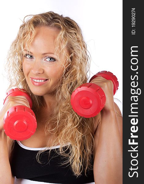 Blonde lifting dumbbells