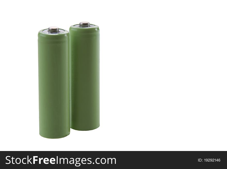 Two green batteries are isolated on a white background. Two green batteries are isolated on a white background