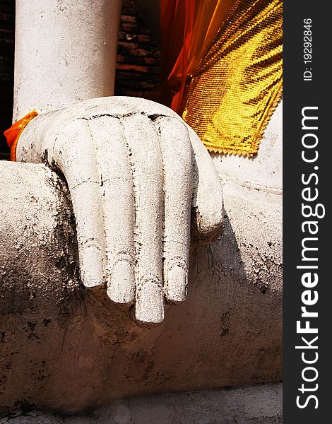 Hand of Buddha a Bodhisattva brown background