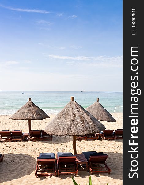 Sunchairs and umbrella on the beach. Sunchairs and umbrella on the beach.