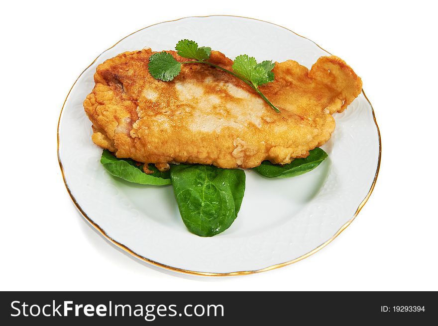 Schnitzel with sorrel leaves and cilantro isolated