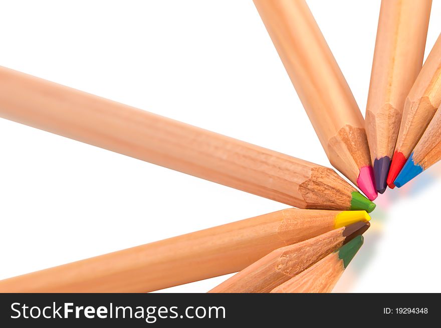 Small colored pencils isolated on white background