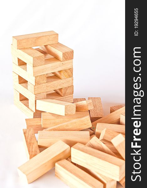 Stack of wooden rectangular blocks on white background