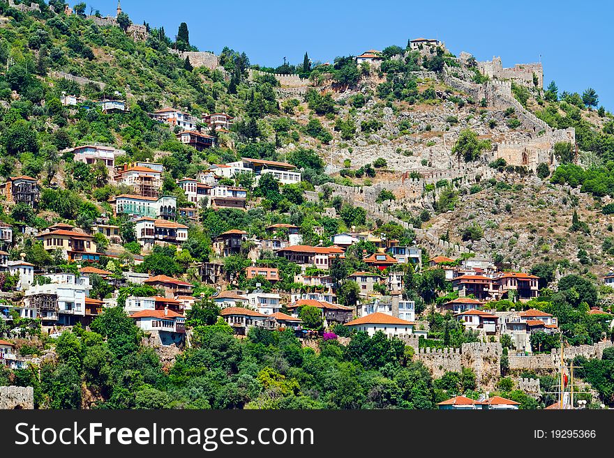 Turkish houses of Mediterranean style on the mountain slope in Alanya. Turkish houses of Mediterranean style on the mountain slope in Alanya