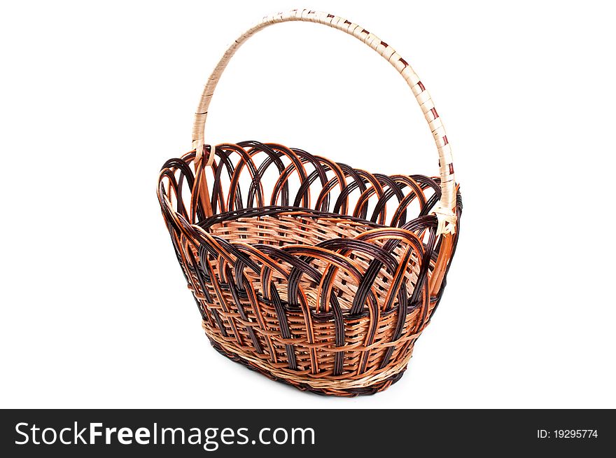 Wicker basket isolated on a white background