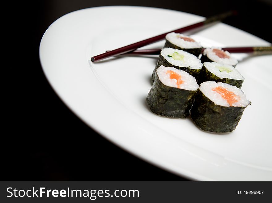Sushi roll hosomaki tuna, salmon and avocado. Sushi roll hosomaki tuna, salmon and avocado