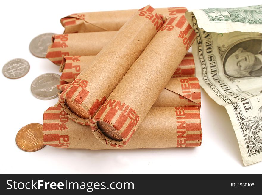 Shot of rolled pennies & $1 bill