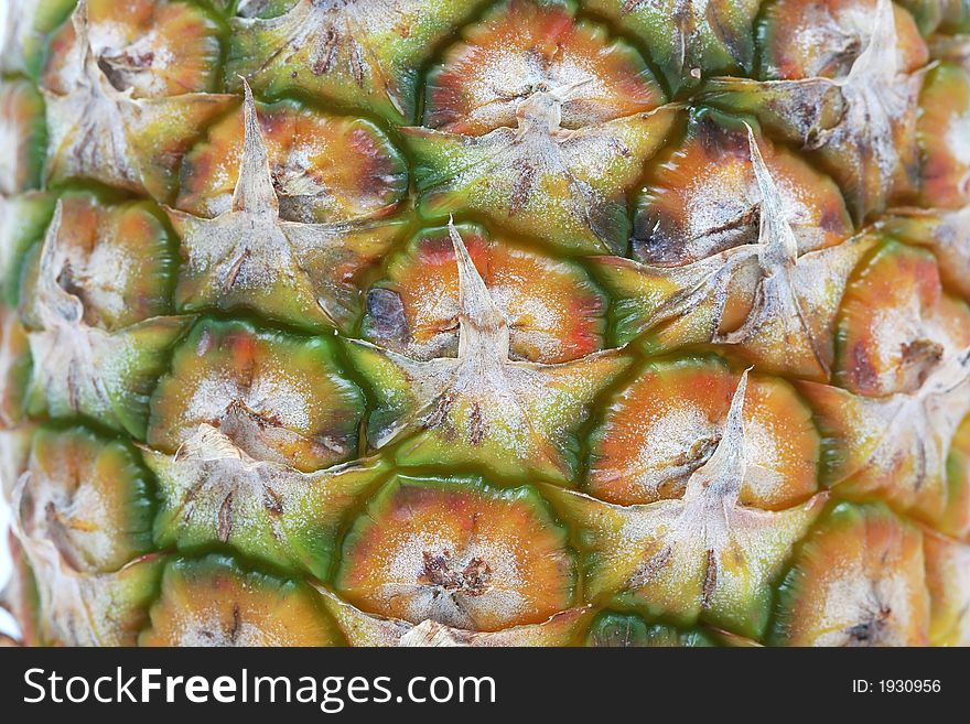 Extreme closeup of the skin on a pineapple, macro shot focus on middle with very high detail. Extreme closeup of the skin on a pineapple, macro shot focus on middle with very high detail