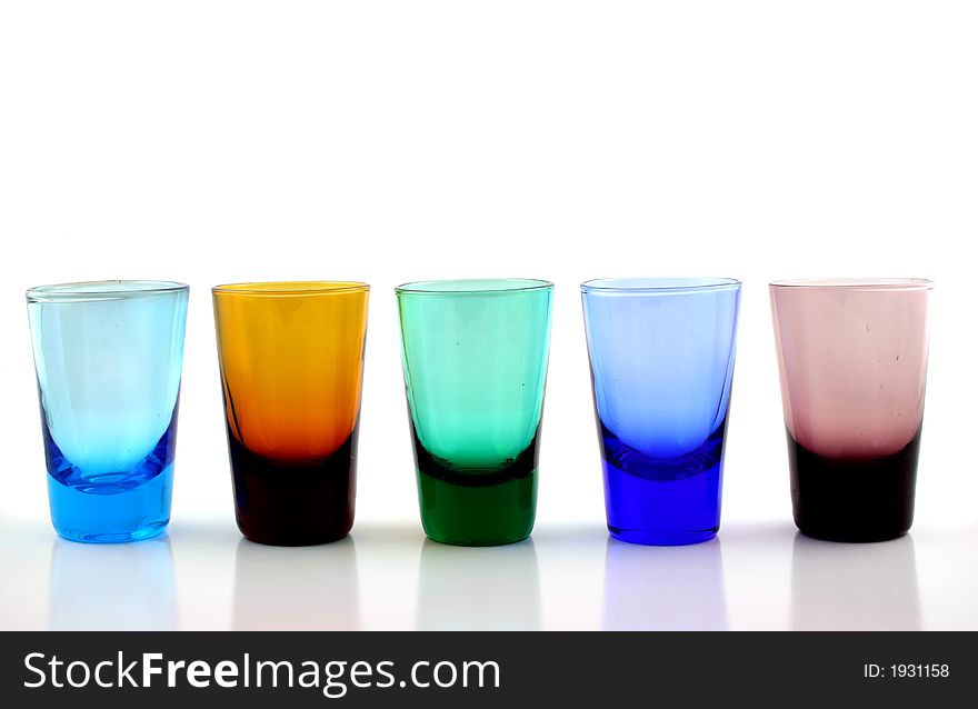 Close up of brightly colored drinking glasses. Close up of brightly colored drinking glasses